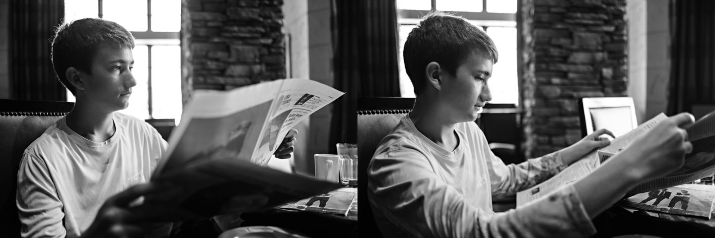 Reunion Resort by popular Atlanta travel blog, Chelissima: image of a boy reading a newspaper.  