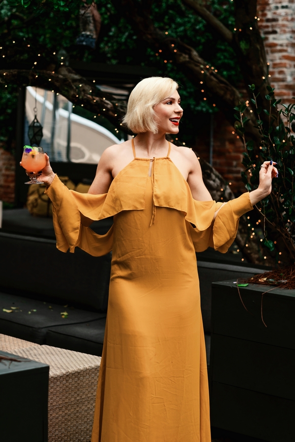 DSCF8156 | Sobou New Orlenas by popular Atlanta travel blog: image of Chelsea Patricia wearing a ASOS missguided dress and holding a alcoholic drink.